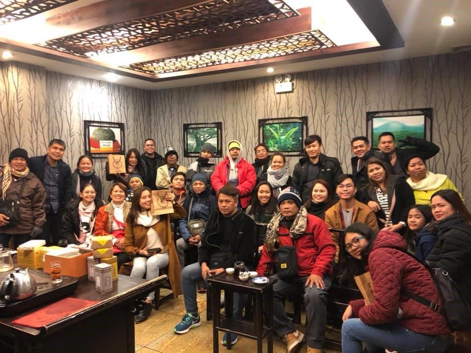 Teams group photo at Kongfu Tea after arrival at Beijing Airport.