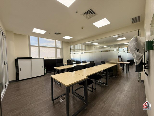 Completed maritime catering management office training room with tables and chairs in Makati City